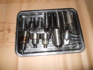 Fuel injector and valve parts